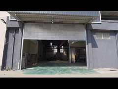 0.8 मिमी मोटाई स्लेट मानक इलेक्ट्रिक गेट बाहरी स्टील शटर औद्योगिक रोलर दरवाजे